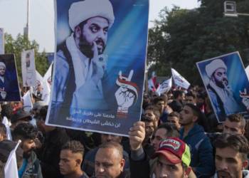 Supporters of Iran-backed militia group in Iraq stage protest over U.S. sanctions