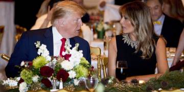 Trumps greeted by applause as they attend song-filled church service on Christmas Eve
