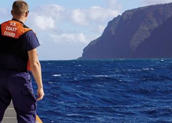 Steep cliffs, thick jungle in the way as U.S. officials probe Hawaii helicopter crash