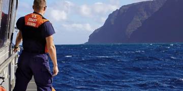Steep cliffs, thick jungle in the way as U.S. officials probe Hawaii helicopter crash