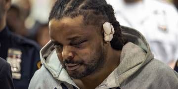 Man accused of shooting NYPD officers in ambush arraigned on attempted murder charges