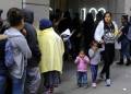 Trump rules restricting green cards for people who use public benefits takes effect