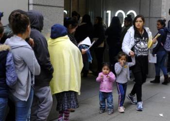 Trump rules restricting green cards for people who use public benefits takes effect