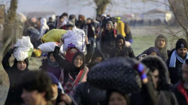 Turkey, Syria fighting escalates; refugees mass at EU border